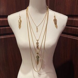 Elegant Gold toned layered Ornamental and Fringe Necklace & clip on Earring Set